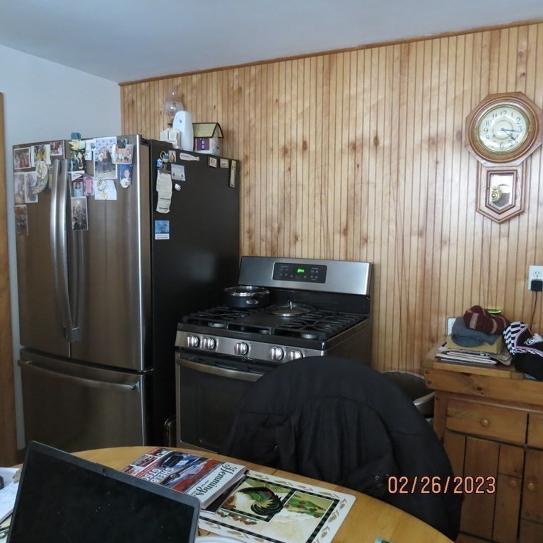 17 Bowl Road Chelmsford, MA 01824 - Photo 8 of 30 a kitchen with a stove and a refrigerator