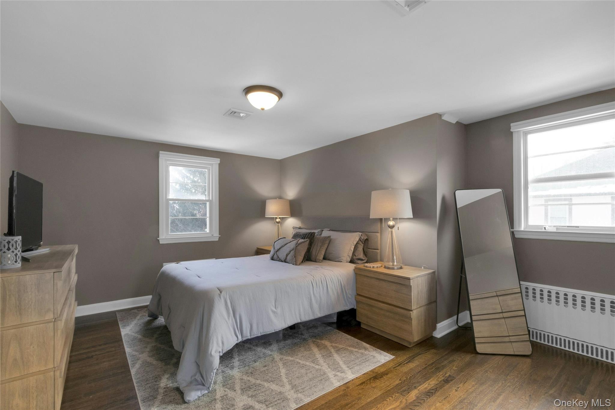 59 Sylvan Road Port Chester, NY 10573 - Photo 15 of 35 Upstairs, a spacious (currently) primary bedroom with multiple windows