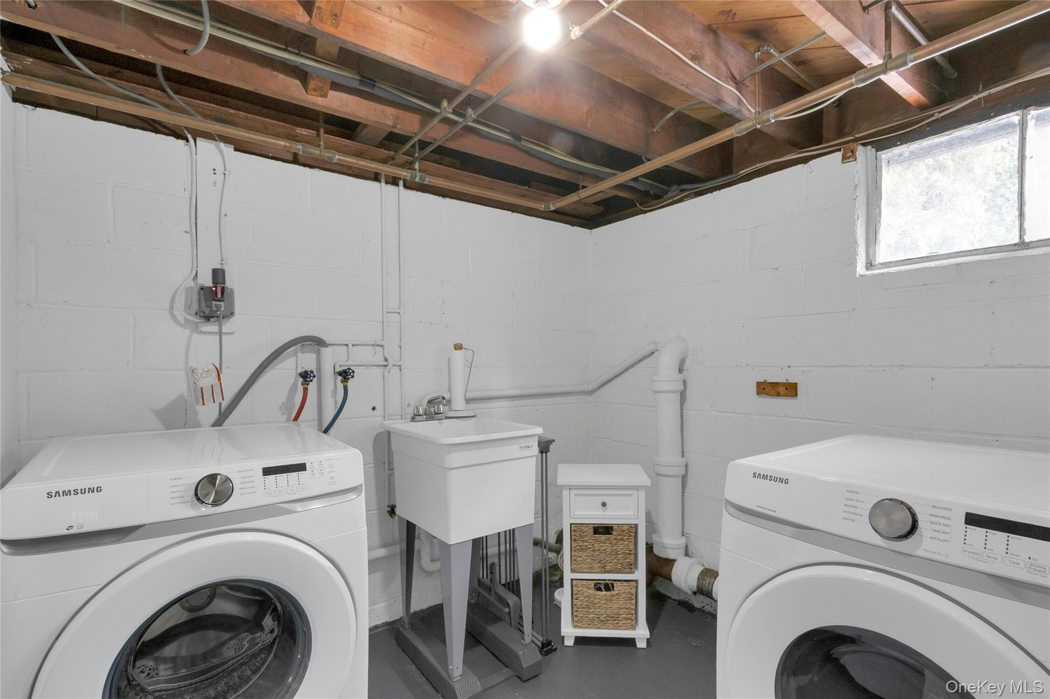 59 Sylvan Road Port Chester, NY 10573 - Photo 23 of 35 Laundry with washer, dryer and utility sink