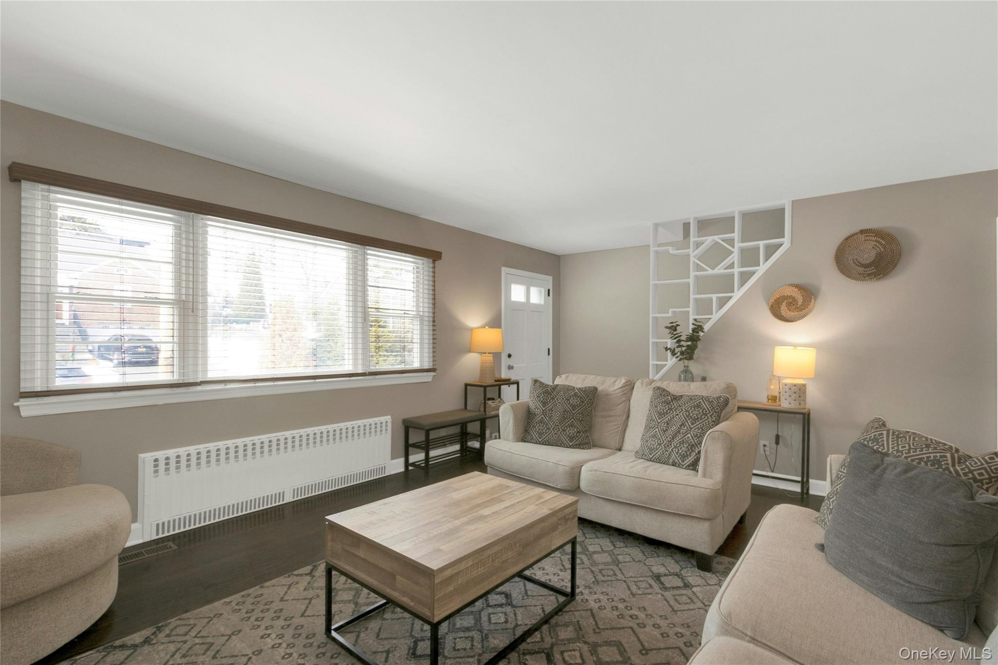 59 Sylvan Road Port Chester, NY 10573 - Photo 4 of 35 The entry (at the far end of this photo) opens into the sunlit living room