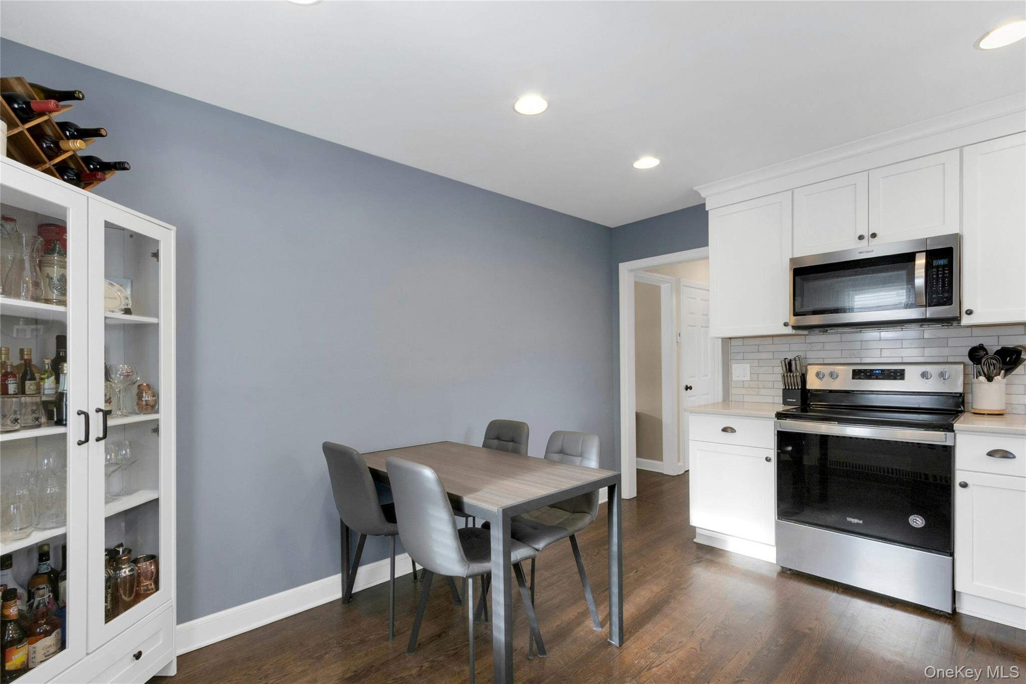 59 Sylvan Road Port Chester, NY 10573 - Photo 7 of 35 The kitchen features stainless steel appliances and wood flooring