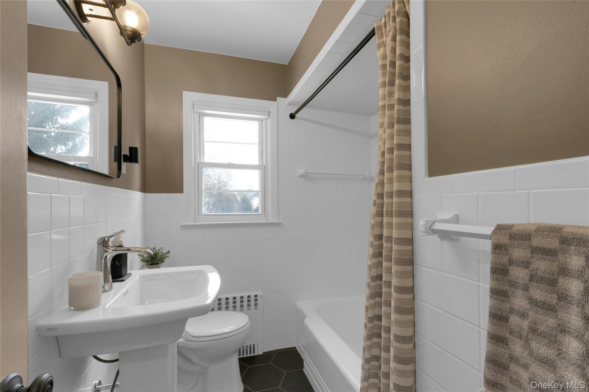 59 Sylvan Road Port Chester, NY 10573 - Photo 8 of 35 A well-lit, bright full first floor bathroom
