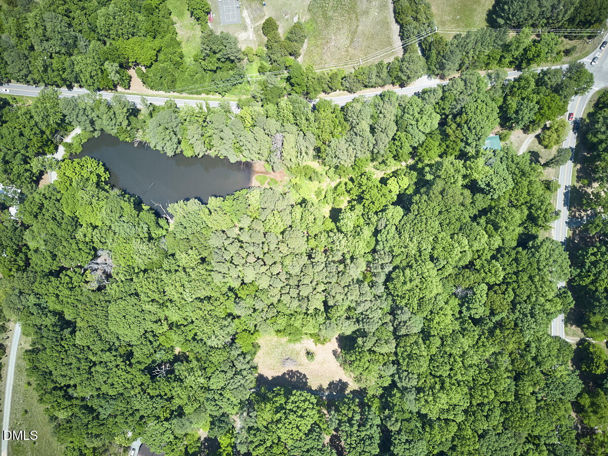 4204 Kerley Road Durham, NC 27705 - Photo 15 of 34 an aerial view of a yard with a tree