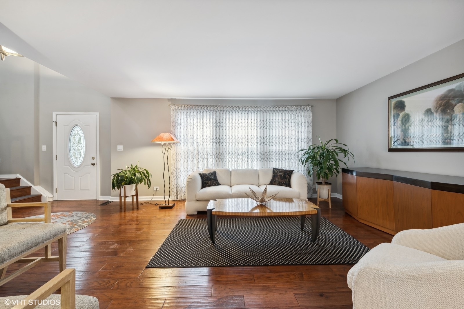 900 Dannet Road Buffalo Grove, IL 60089 - Photo 6 of 31 a living room with furniture and wooden floor