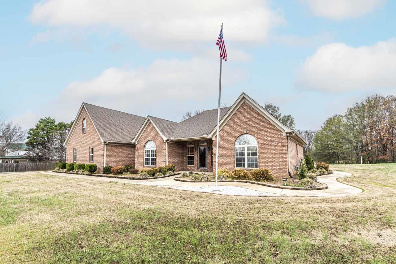3876 West Union Road Millington, TN 38053 - Photo 21 of 40 View of front facade featuring brick siding and roof with shingles