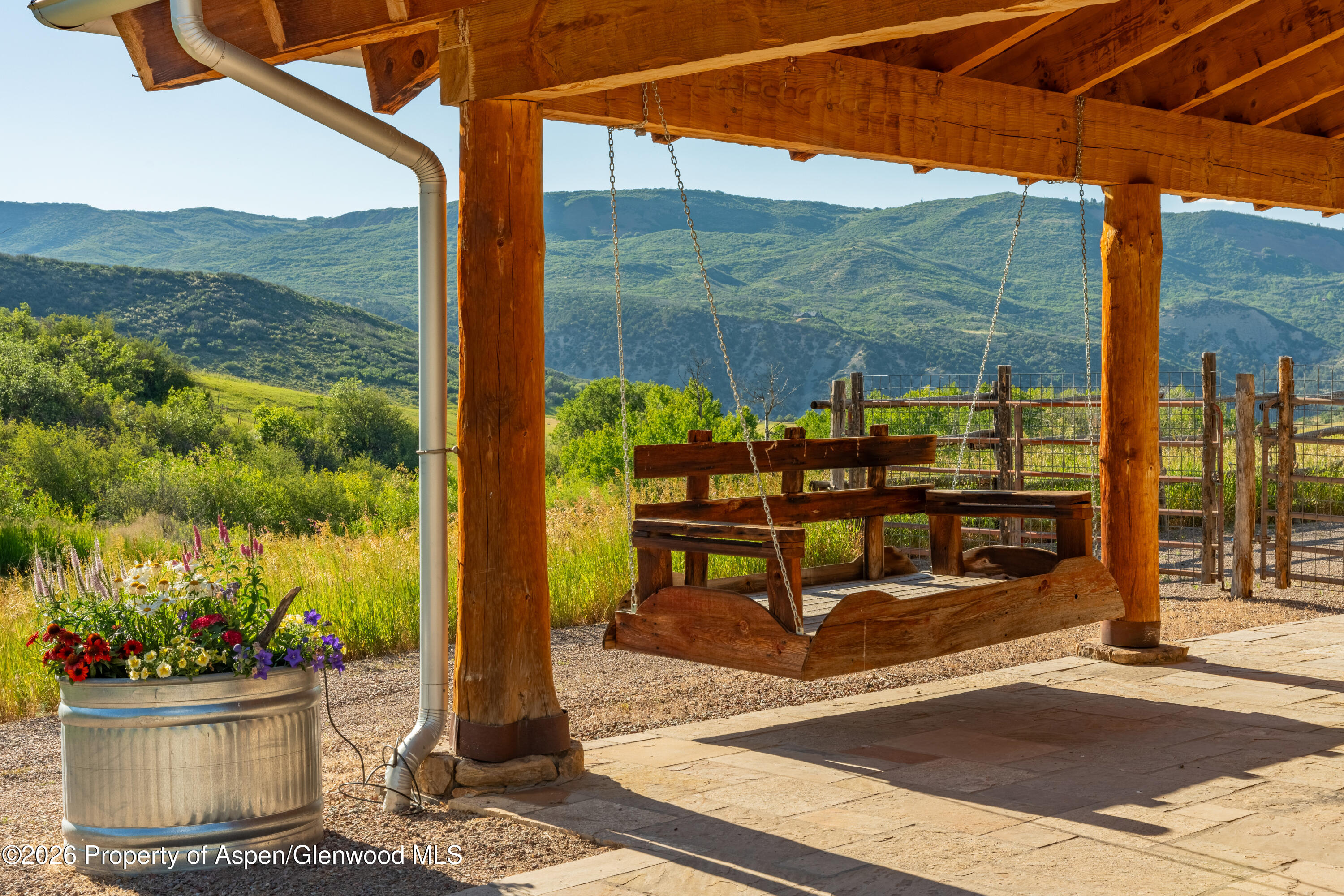 1350 Old Herron Road Basalt, CO 81621 - Photo 54 of 81 a view of a porch with a table and chairs