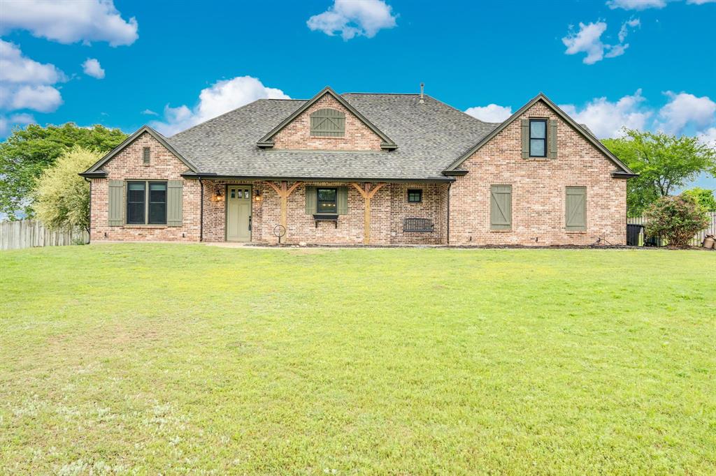 3052 Keri Lane Midlothian, TX 76065 - Photo 1 of 40 a front view of a house with yard