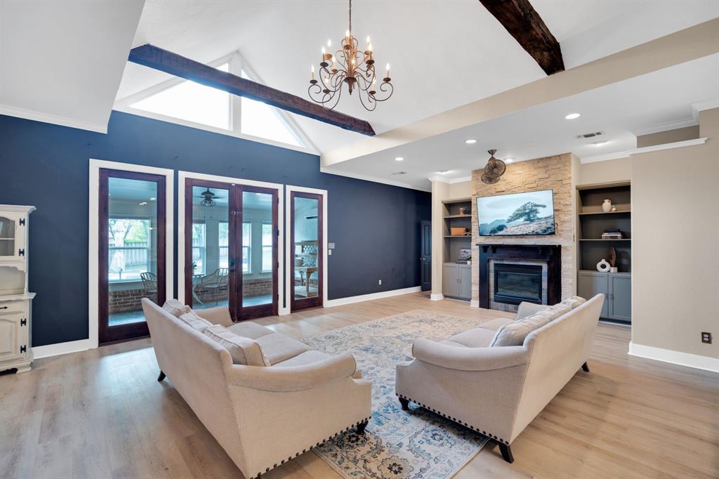 3052 Keri Lane Midlothian, TX 76065 - Photo 14 of 40 a living room with fireplace furniture and a large window