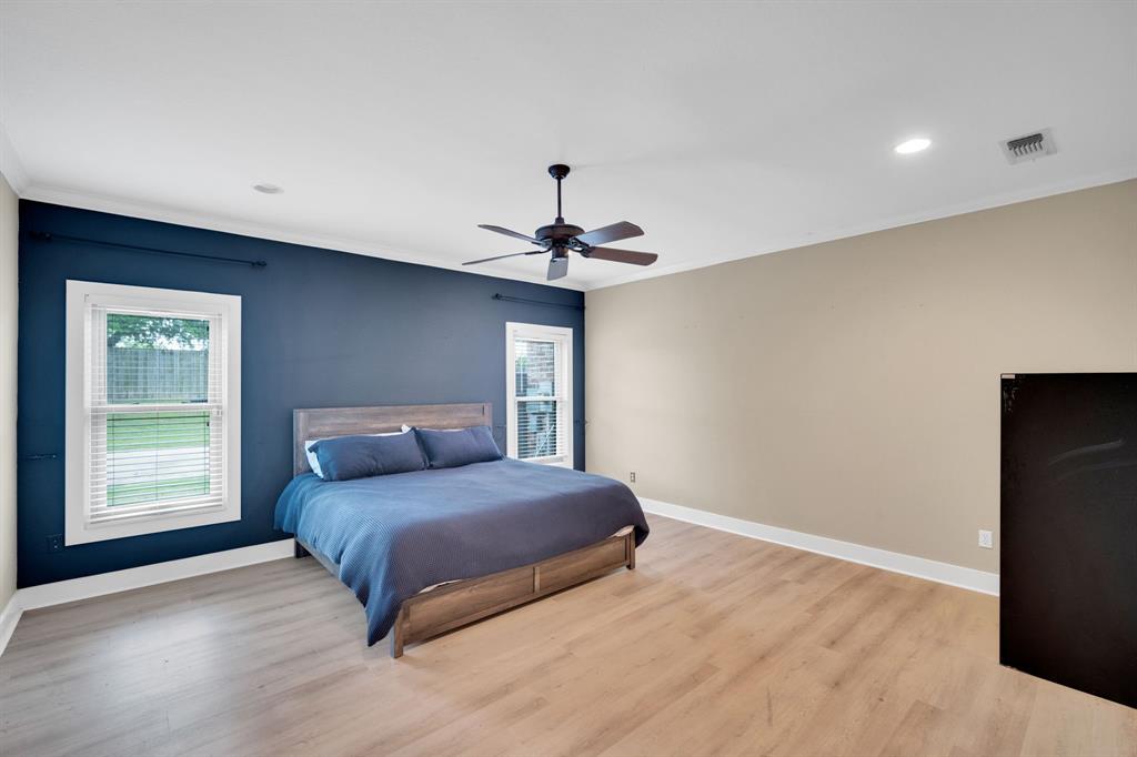 3052 Keri Lane Midlothian, TX 76065 - Photo 28 of 40 a bedroom with a bed and a window