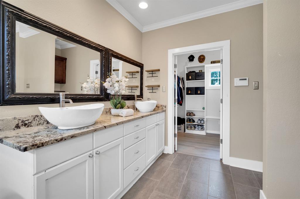 3052 Keri Lane Midlothian, TX 76065 - Photo 30 of 40 a bathroom with a granite countertop sink and a mirror