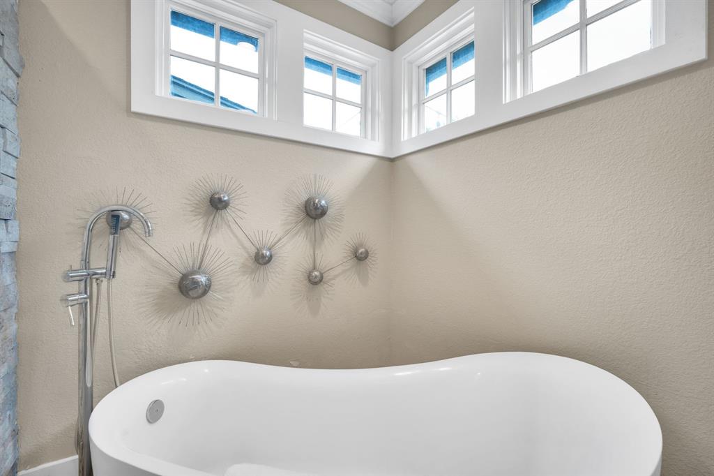 3052 Keri Lane Midlothian, TX 76065 - Photo 33 of 40 a white bath tub sitting next to a window