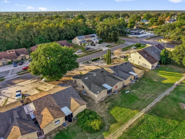 an aerial view of a house with a garden