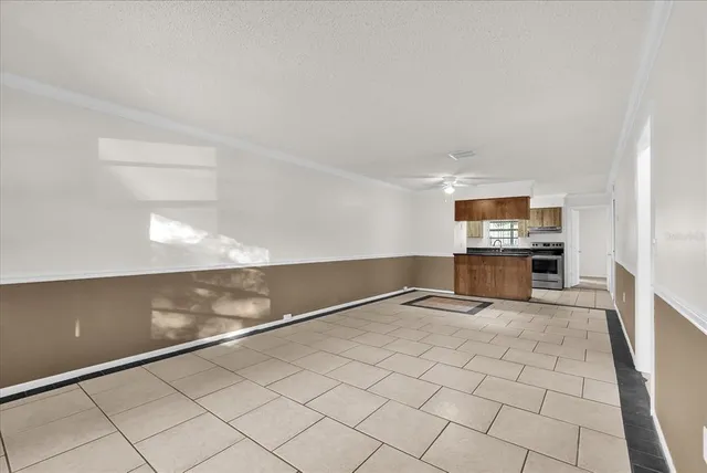 a view of a kitchen with microwave and cabinets