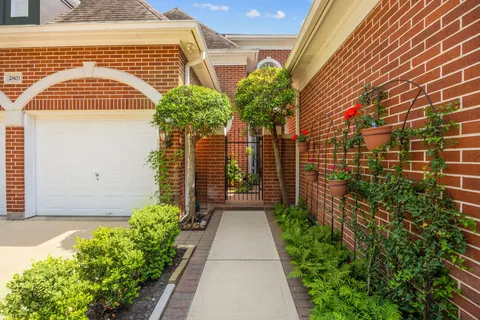 a house view with a garden space