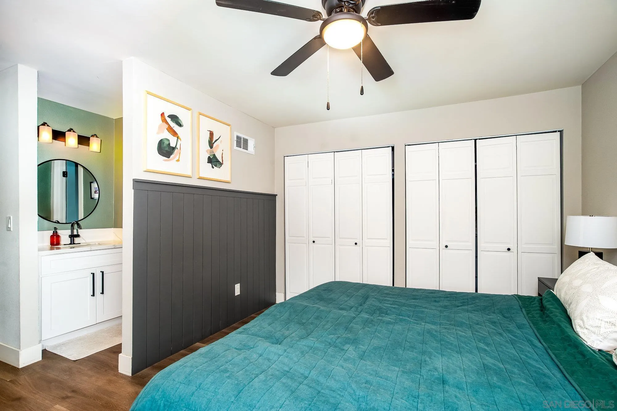 10753 Valor Place Santee, CA 92071 - Photo 14 of 24 a bedroom with a bed and a chandelier