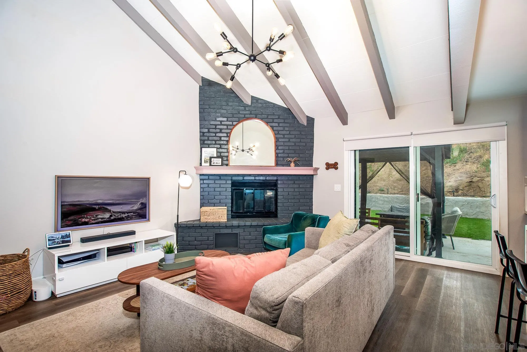 10753 Valor Place Santee, CA 92071 - Photo 6 of 24 a living room with furniture a large window and a flat screen tv