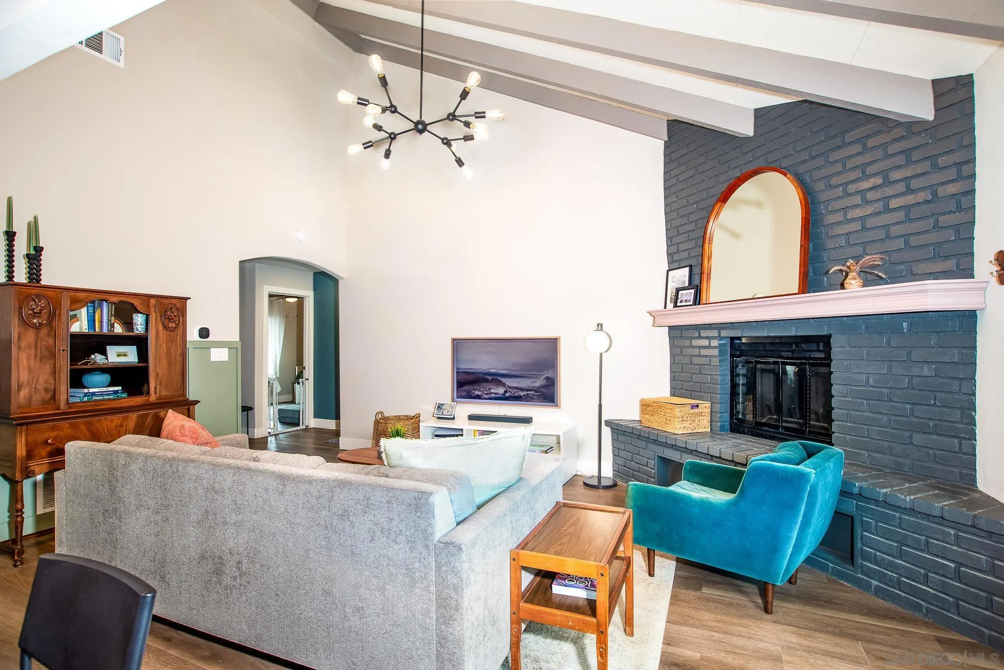 10753 Valor Place Santee, CA 92071 - Photo 7 of 24 a living room with furniture and a fireplace