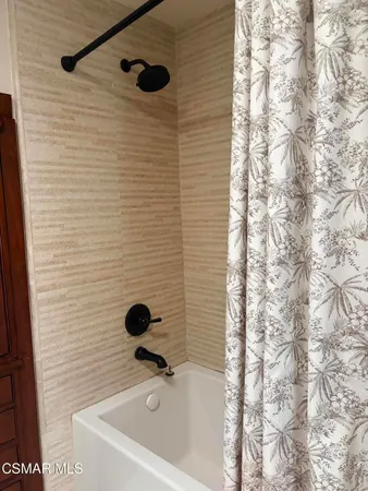 a bathroom with a tub