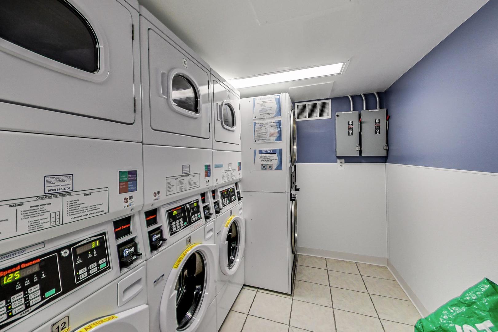 5901 North Sheridan Road, Unit 6K Chicago, IL 60660 - Photo 32 of 39 a utility room with dryer and washer