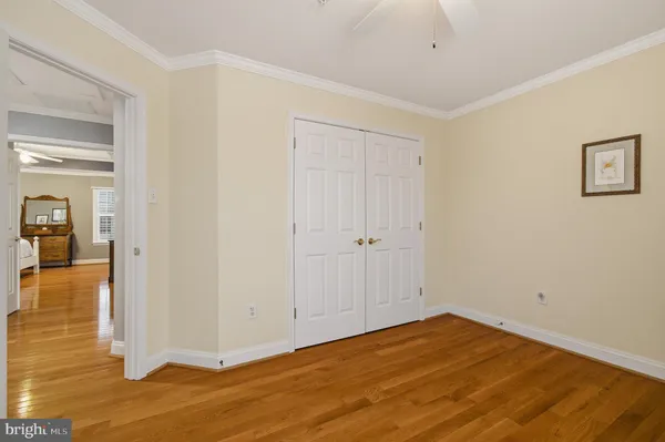 a large kitchen with stainless steel appliances lots of counter space and a sink