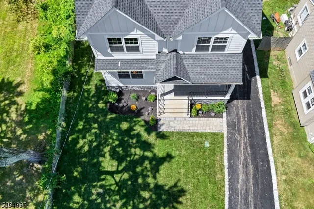 a house view with a garden space