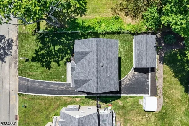 an aerial view of a house having yard