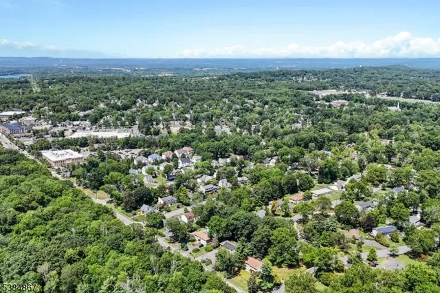 an aerial view of a city with lots of residential buildings