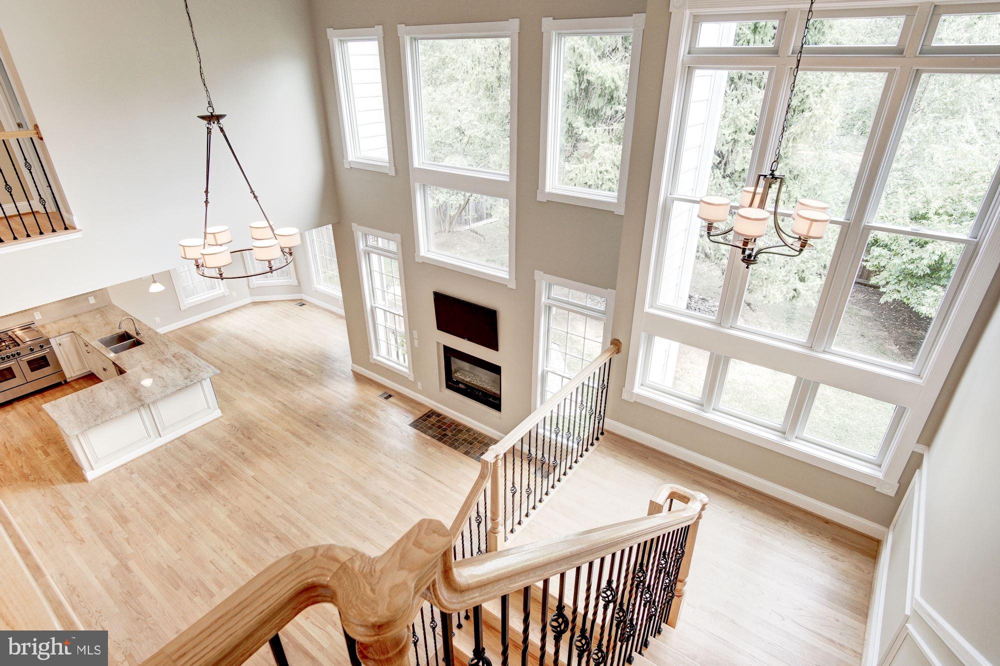9911 Old Georgetown Road Bethesda, MD 20814 - Photo 13 of 24 Light-filled windows in 2-story family room