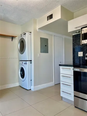a view of washer and dryer in a utility room