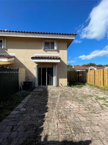 a view of a house with a patio
