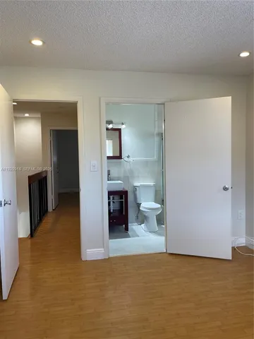 a view of a kitchen with a sink