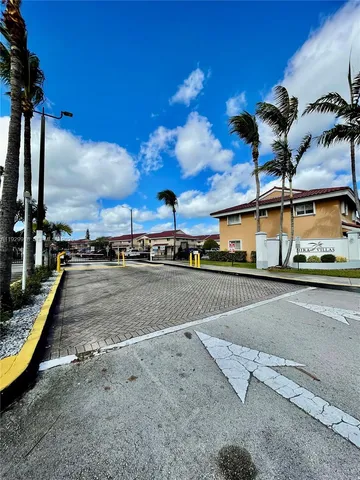 a view of a swimming pool with a chair