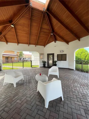 a view of a park with a tree