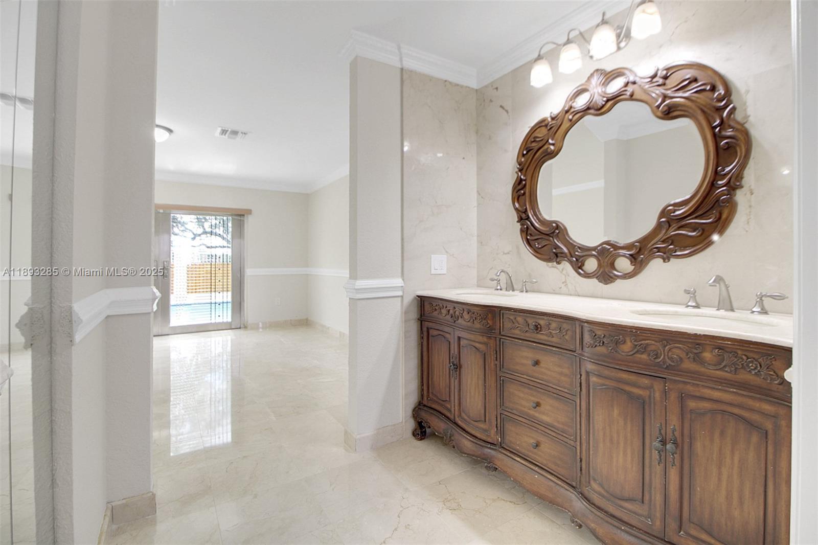 8416 Northwest 201st Street Hialeah, FL 33015 - Photo 24 of 40 The doors are security doors imported from Mexico. They have intricate grills between the glass panes.