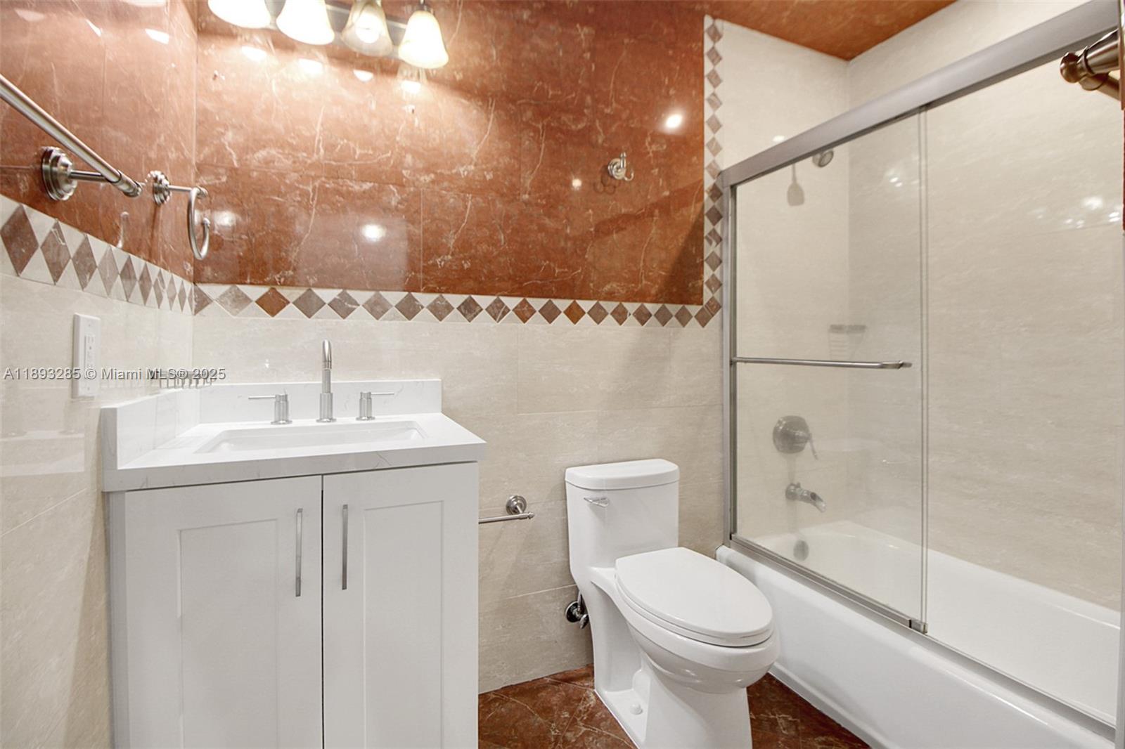 8416 Northwest 201st Street Hialeah, FL 33015 - Photo 26 of 40 There two bathrooms upstairs. This is one of them.