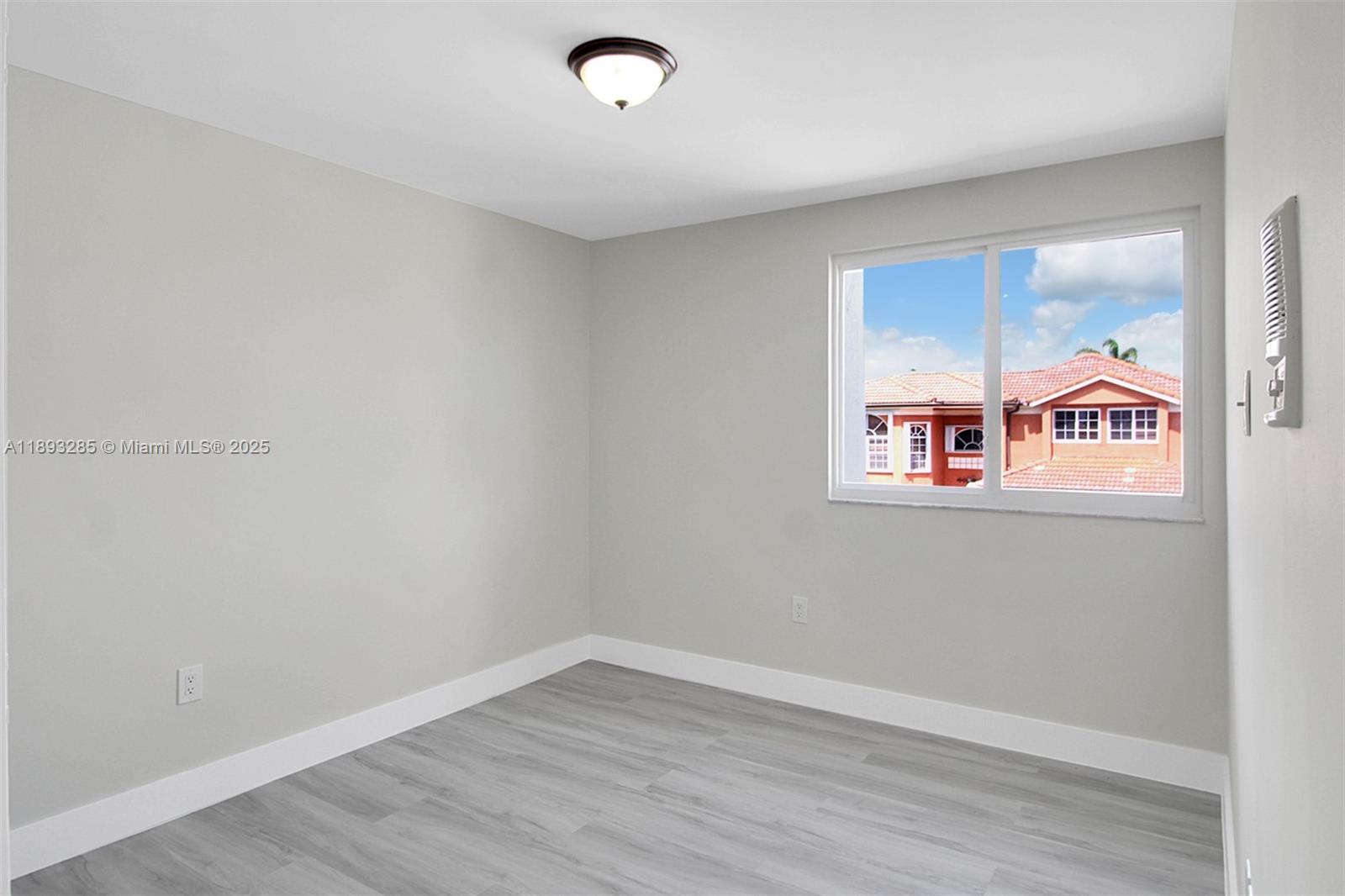 8416 Northwest 201st Street Hialeah, FL 33015 - Photo 28 of 40 There are 4 bedrooms upstairs, all similar in size.