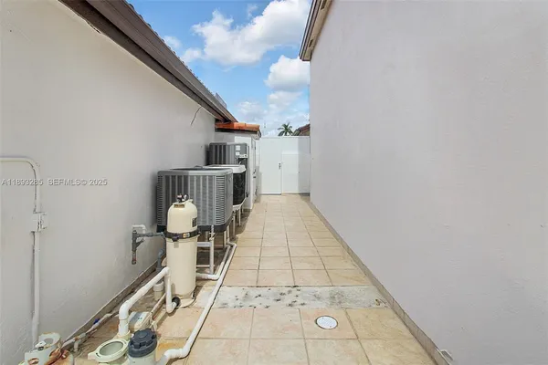 a view of a kitchen with a sink