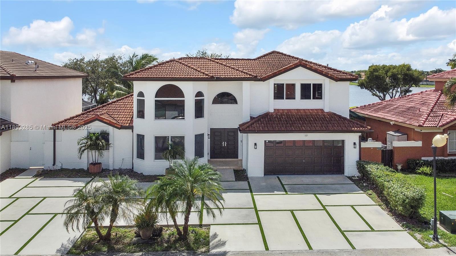 8416 Northwest 201st Street Hialeah, FL 33015 - Photo 38 of 40 Home faces north.