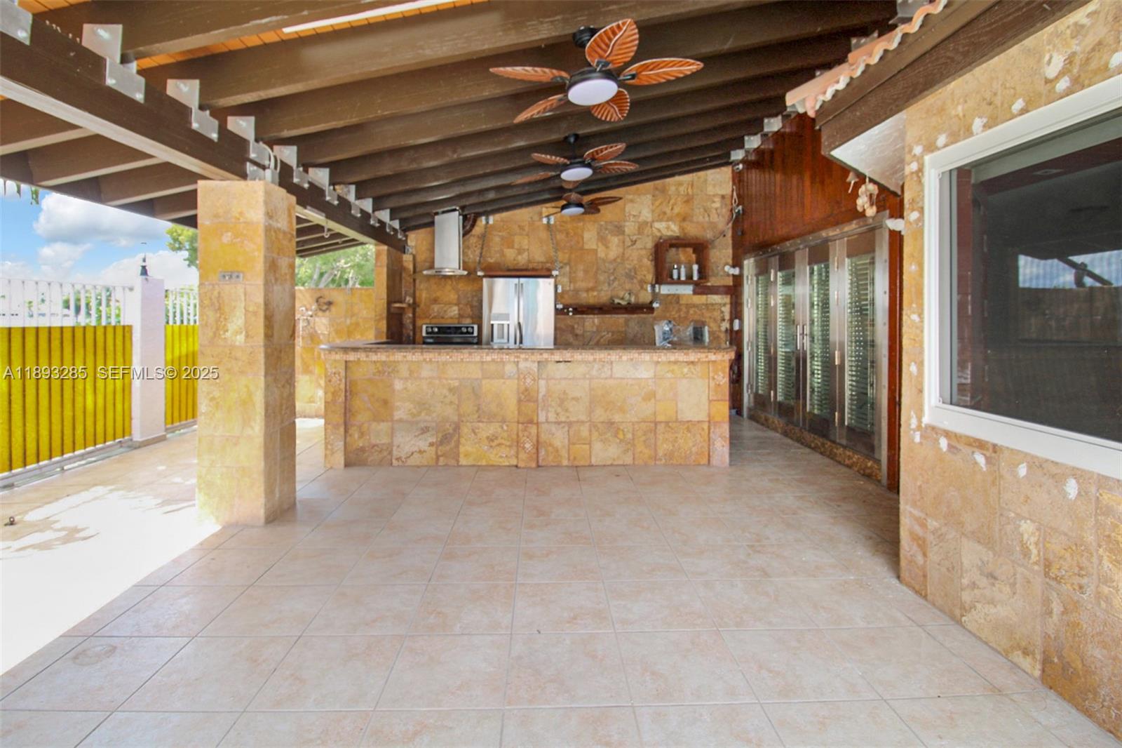 8416 Northwest 201st Street Hialeah, FL 33015 - Photo 4 of 40 Fantastic summer kitchen includes full size appliances. There is a gas hook-up already in place ready for use.