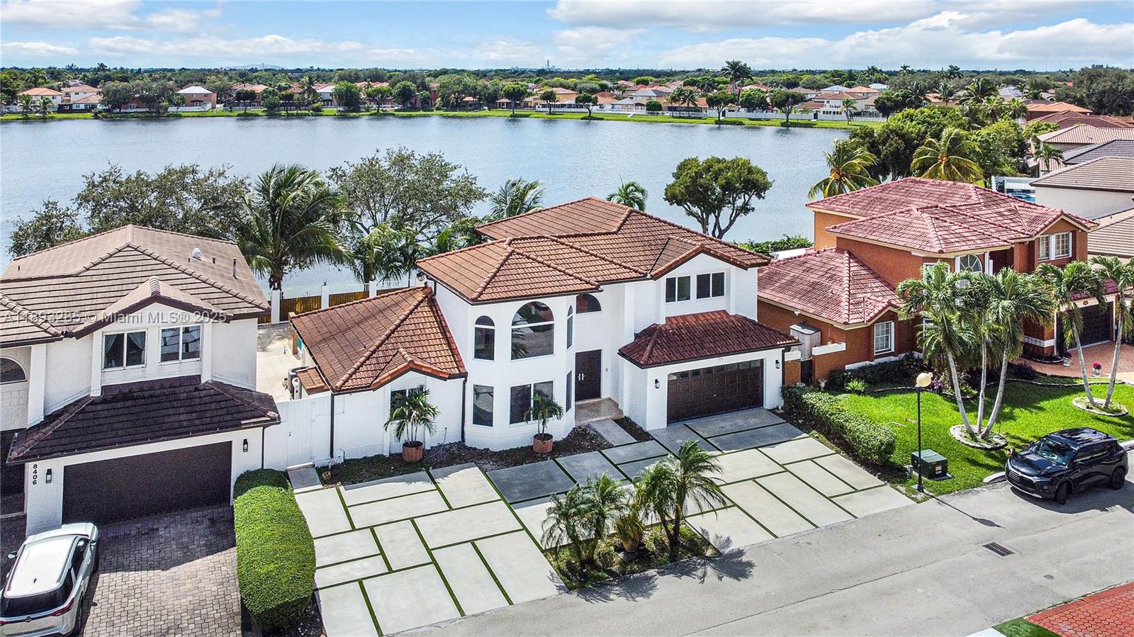 8416 Northwest 201st Street Hialeah, FL 33015 - Photo 6 of 40 Lake is behind the home (south).