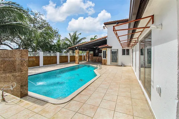 a view of a patio with a yard