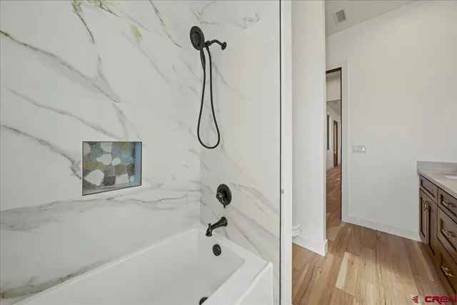 a view of an empty walk in closet