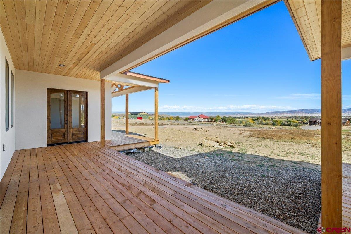 14447 5950 Road Montrose, CO 81403 - Photo 3 of 45 a view of a room with wooden floor