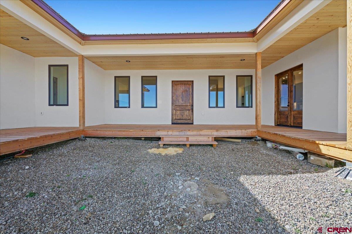 14447 5950 Road Montrose, CO 81403 - Photo 4 of 45 a house view with a sitting space