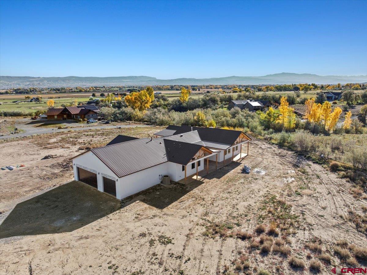 14447 5950 Road Montrose, CO 81403 - Photo 43 of 45 an aerial view of a house with a ocean view