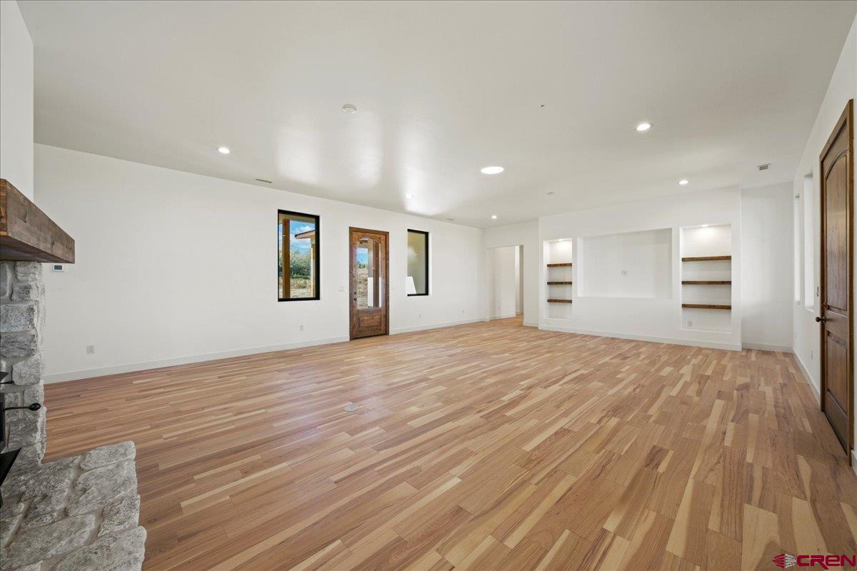 14447 5950 Road Montrose, CO 81403 - Photo 5 of 45 a view of empty room with kitchen and window