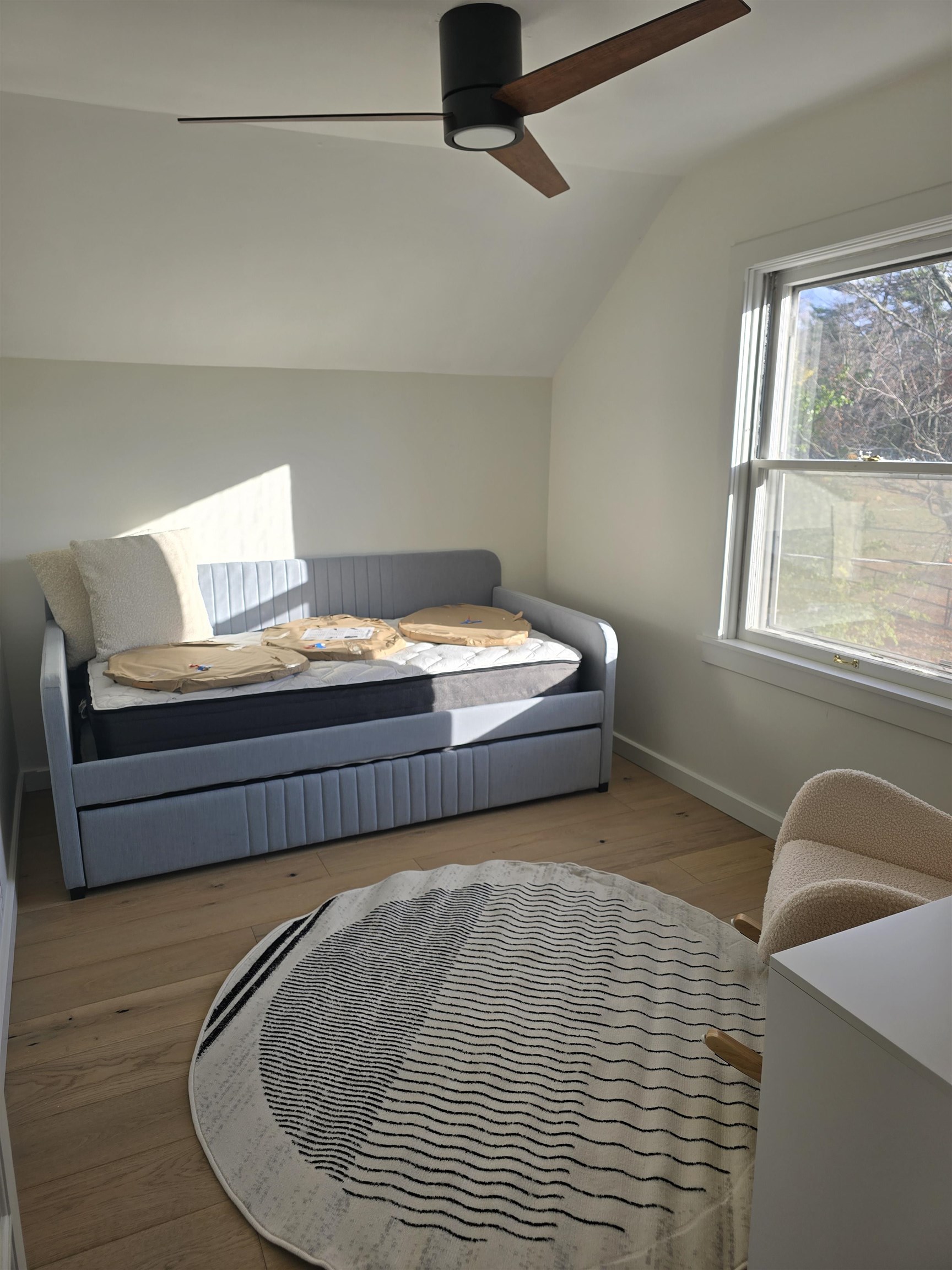 321 Rice Avenue Bayfield, WI 54814 - Photo 13 of 30 Bedroom featuring lofted ceiling, engineered hardwood floors, and ceiling fan
