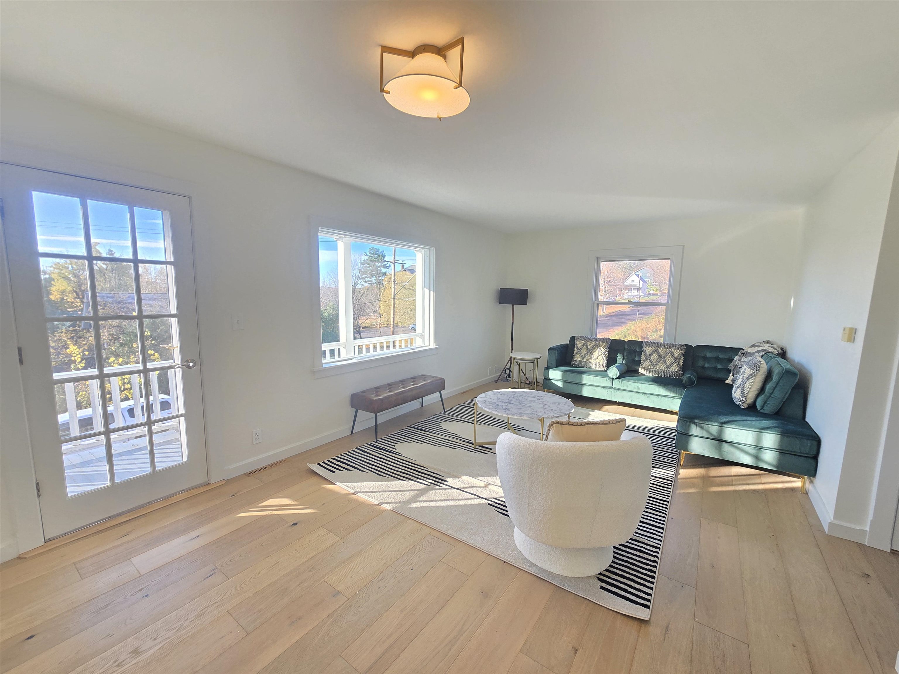 321 Rice Avenue Bayfield, WI 54814 - Photo 6 of 30 Living room featuring light hardwood / wood-style flooring