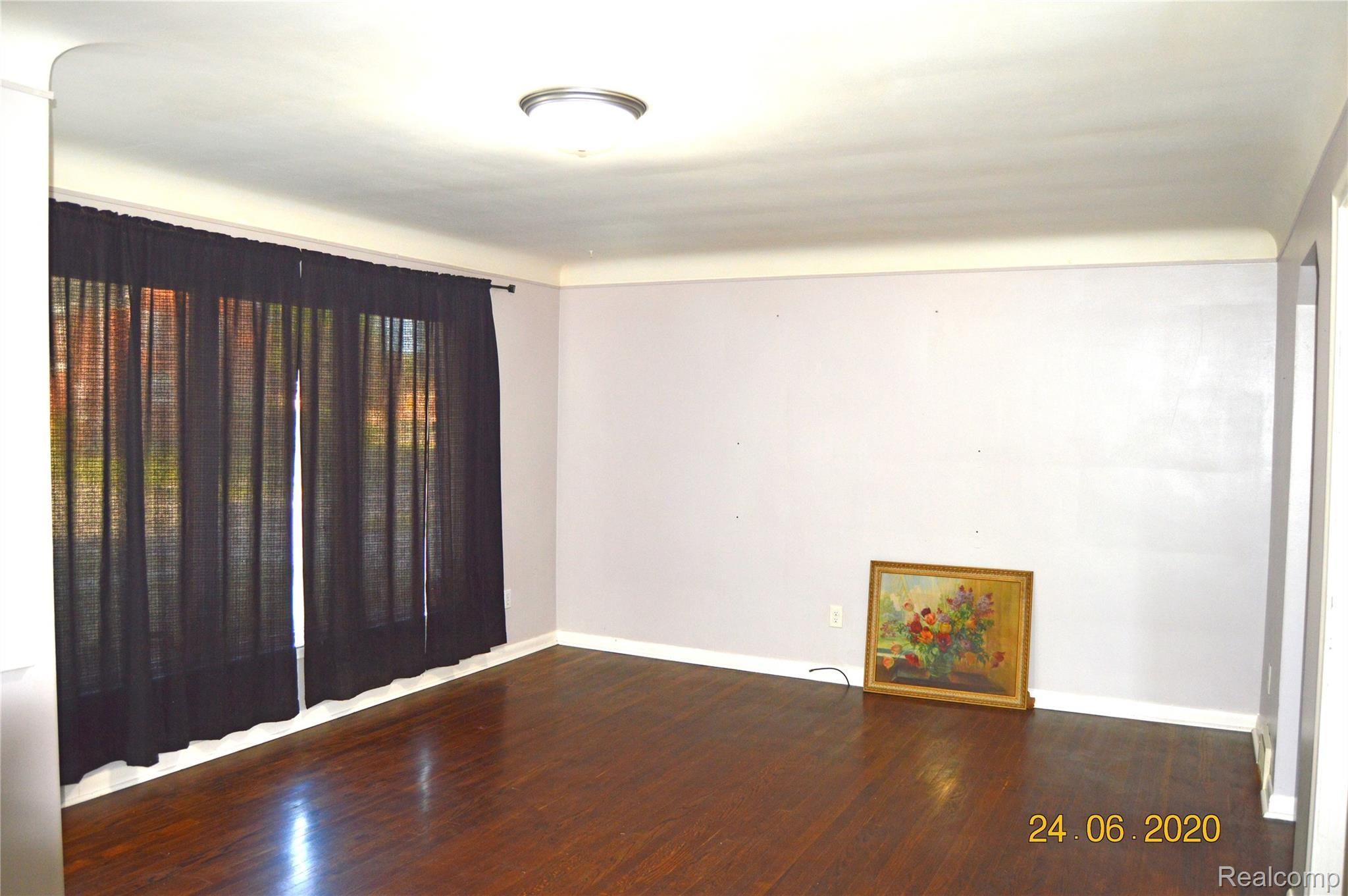 9531 Salem Road Redford, MI 48239 - Photo 2 of 12 Family room with gleaming hardwood floor and large picture window
