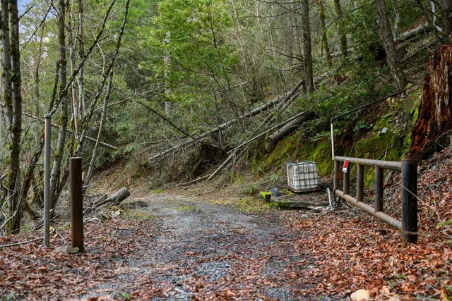 a front view of a houses with street